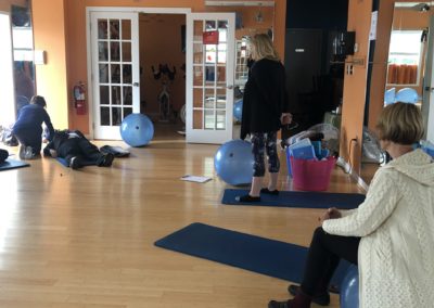 people using fitness balls