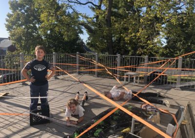 kids crawling under obstacles